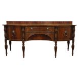 'Maitland Smith' Regency style figured mahogany and mahogany banded sideboard, serpentine front,