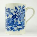 Caughley mug, c1780, decorated in the Parrot Pecking Fruit pattern, with grooved loop handle,