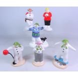 Six Coalport The Snowman figurines; 'It's a Knockout', 'Balancing Act', Cowboy Jig', 'Dressing Up',