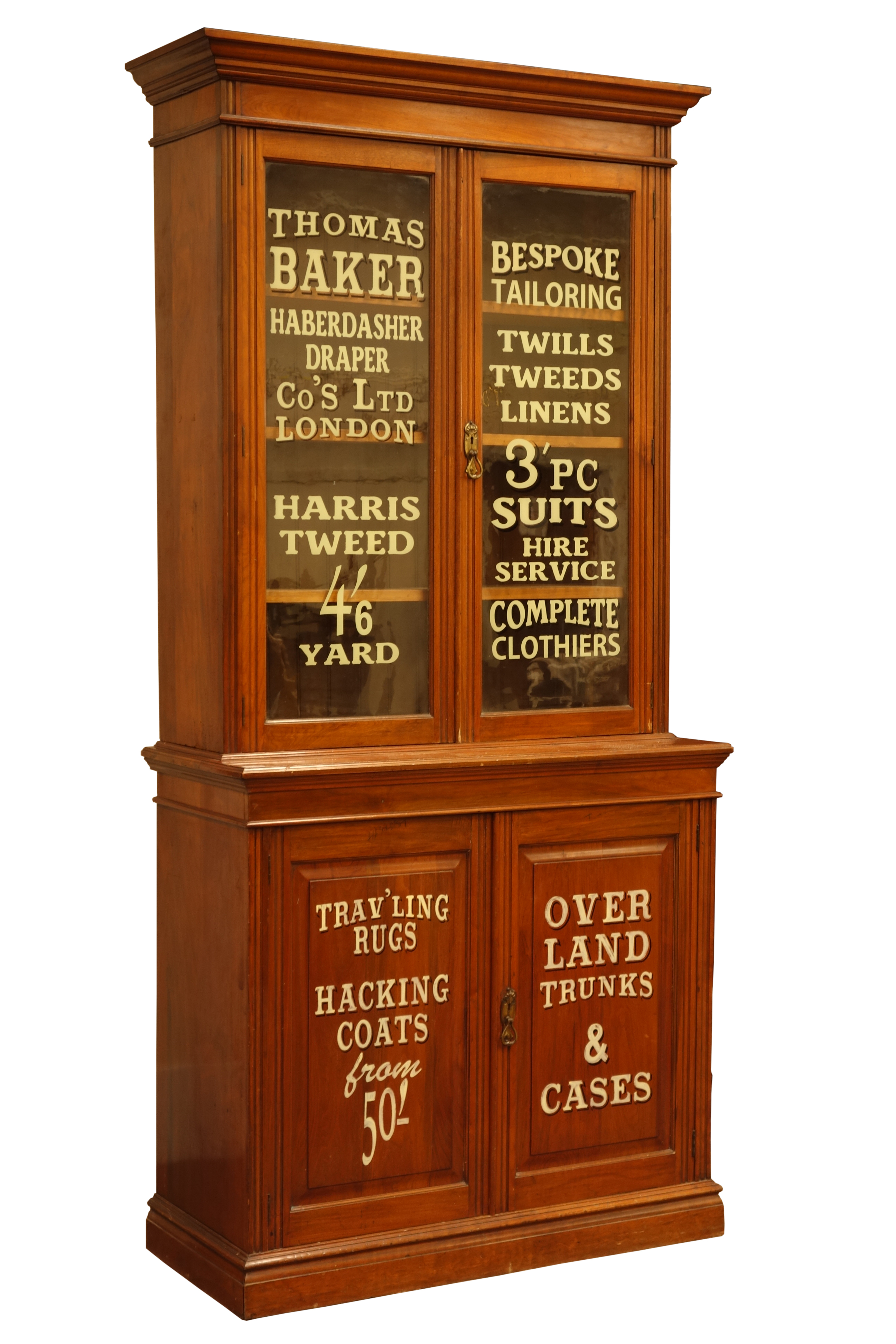 Edwardian walnut bookcase on cupboard, two glazed doors above panelled double cupboard,