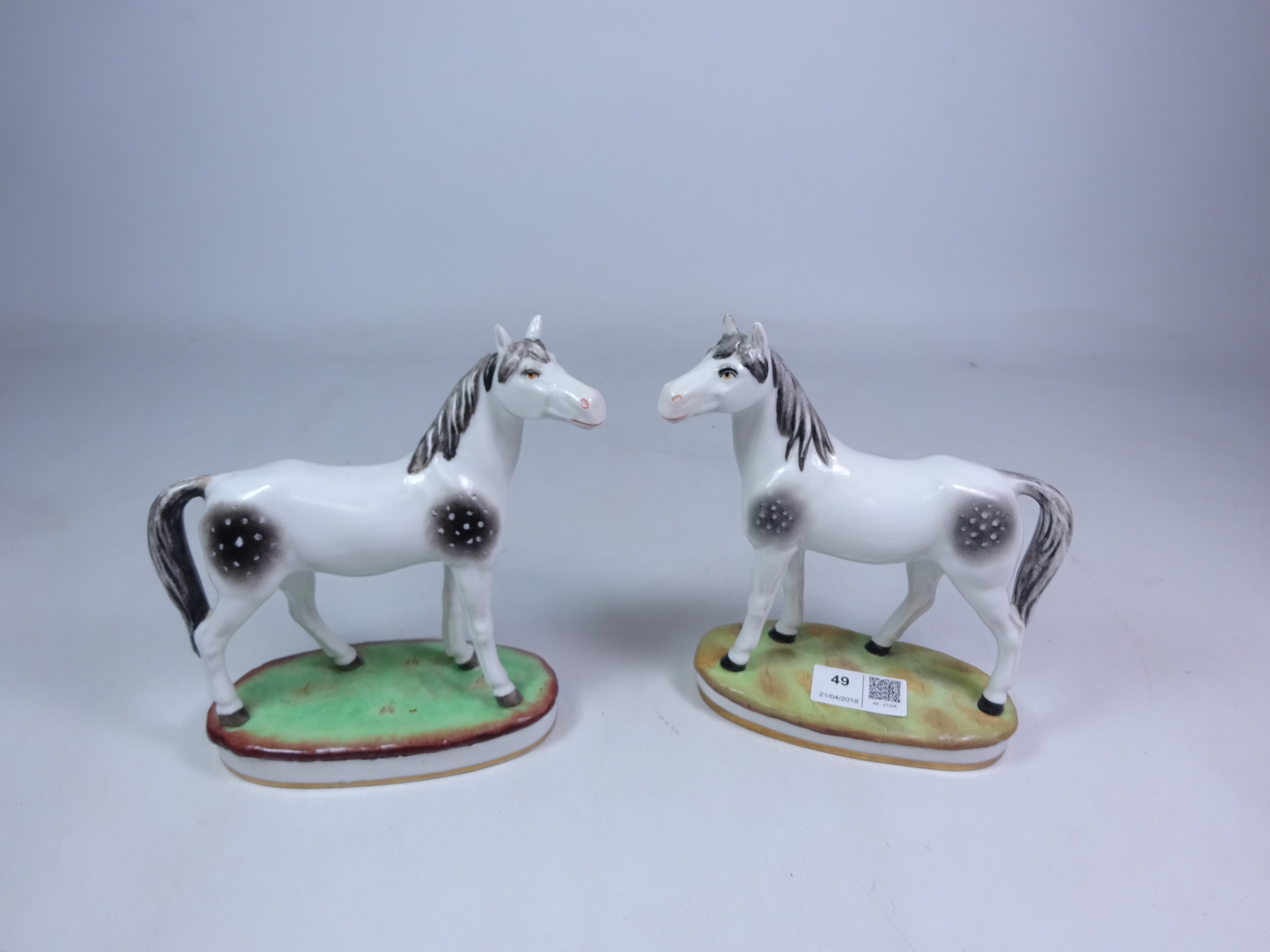 Two Chelsea style models of grey horses with gold anchor marks (2) Condition Report