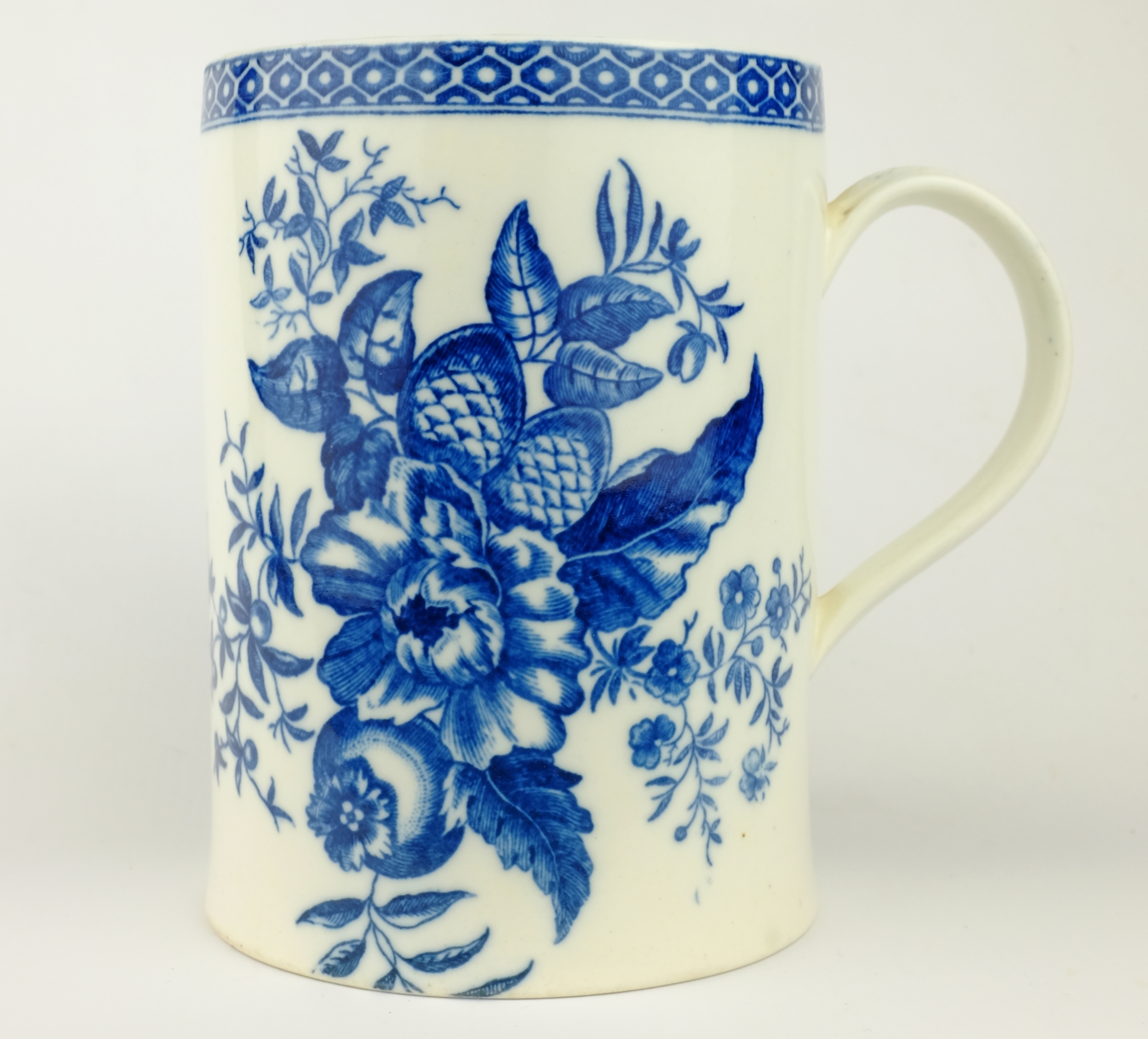 Caughley quart jug, c1780, decorated in the 'Pine Cone' pattern below a diaper border,