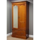 Edwardian mahogany double wardrobe, projecting cornice above mirror glazed and panelled doors,