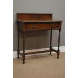 Early 20th century medium oak side table with raised back, single drawer, barley twist supports,