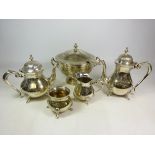 Four piece silver-plated ornate tea set and a similar twin handled soup tureen with ladle (5)