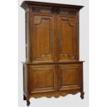 19th century French carved oak cupboard, fitted with four shaped panelled doors,