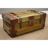 Early 20th century green canvas and leather bound travelling trunk,