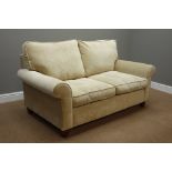 'Laura Ashley' two seat sofa upholstered in champagne fabric,