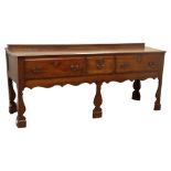18th century oak dresser base, two drawers, centre false drawer,