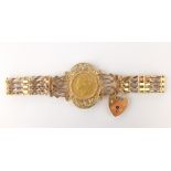1870 shield back half sovereign in wide gold filigree loose mount on a four bar bracelet hallmarked
