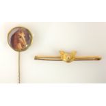 Gold fox mask stock pin stamped 9ct and horse head miniature gold stick pin tested to 9ct