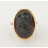 Rose gold ring with carved intaglio centurion head tested to 9ct Condition Report