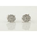 Pair of white gold diamond cluster stud ear-rings stamped 9k Condition Report