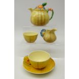 Clarice Cliff 'Marguerite' pattern matched tea set for one comprising; teapot, milk jug,