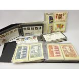 Collection of PHQ cards and two albums of mainly 1980's first day covers,