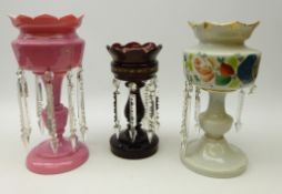 Two Victorian opaque glass lustres and a ruby red glass lustre,