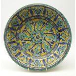 Early 19th century Persian pottery bowl with Iznik style decoration,