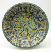Early 19th century Persian pottery bowl with Iznik style decoration,