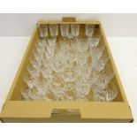 Matched suite of crystal drinking glasses comprising; five champagne flutes, nine red wine goblets,