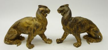 Pair of early 20th century gilt cast iron models of snarling Panthers,