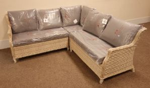 Wicker three piece corner conservatory/garden lounge suite, with grey upholstered loose cushions,