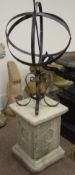 Large wrought armillary sphere sundial on a stone finish plinth,