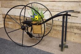 19th century 'Richmond & Chandler' black painted wrought metal architectural seed drill garden