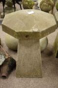 Large composite stone staddle stone octagonal domed top on taopered textured column,