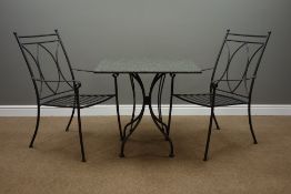 'Neptune' wrought metal patio table with granite top and two matching armchairs,