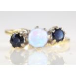 Three stone sapphire and opal gold ring hallmarked 9ct Condition Report <a