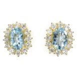 Pair of gold aquamarine and round brilliant cut diamond cluster ear-rings hallmarked 18ct