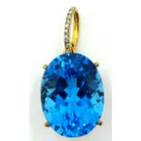 9ct gold oval topaz and diamond pendant hallmarked Condition Report Approx 6.