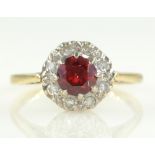 Garnet and diamond cluster ring hallmarked 9ct Condition Report Approx 2.