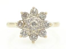 Diamond cluster 18ct white gold ring stamped 18ct Condition Report 5.
