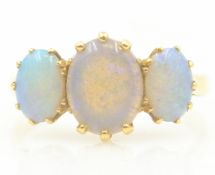 Three stone opal gold ring stamped 18ct Condition Report 3.