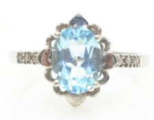 White gold oval aquamarine and diamond ring hallmarked 9ct Condition Report Approx 1.