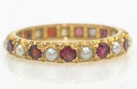 Garnet and seed pearl eternity ring hallmarked 9ct Condition Report approx 2.
