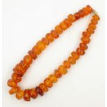 Single strand amber bead necklace approx 90gm Condition Report 41.