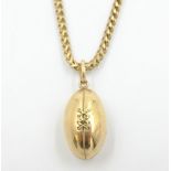 9ct gold snake chain necklace with rugby ball pendant approx 24.