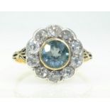 Aquamarine and diamond gold cluster ring stamped 18 Condition Report approx 2.