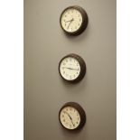 Three 1940's Smiths English Clock Systems London slave clocks with white Arabic dials in Bakelite