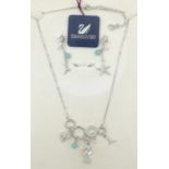 Swarovski crystal sea horse nacklace, pair matching ear-rings, a crystal pendant necklace,