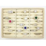 Collection of silver stone set dress rings in a ring tray Condition Report <a