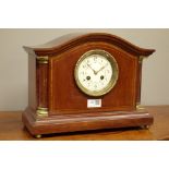 Edwardian inlaid mahogany serpentine top mantel clock,