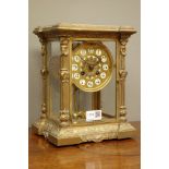 Late 19th century French gilt metal four glass mantel clock, circular dial with inset numerals,