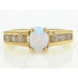 Gold opal and stone set ring hallmarked 9ct Condition Report Approx 3.