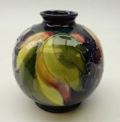 Moorcroft grape and leaf pattern spherical vase, circa 1928 - 1935,