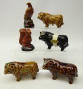 Three full Rutherford's Whisky miniature porcelain bull decanters & one without contents,