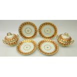 Early 19th century Derby porcelain set of four desert plates painted with gilt and iron red