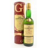 The Glenlivet Pure Single Malt Whisky aged 12 years, with girt tag & promo.